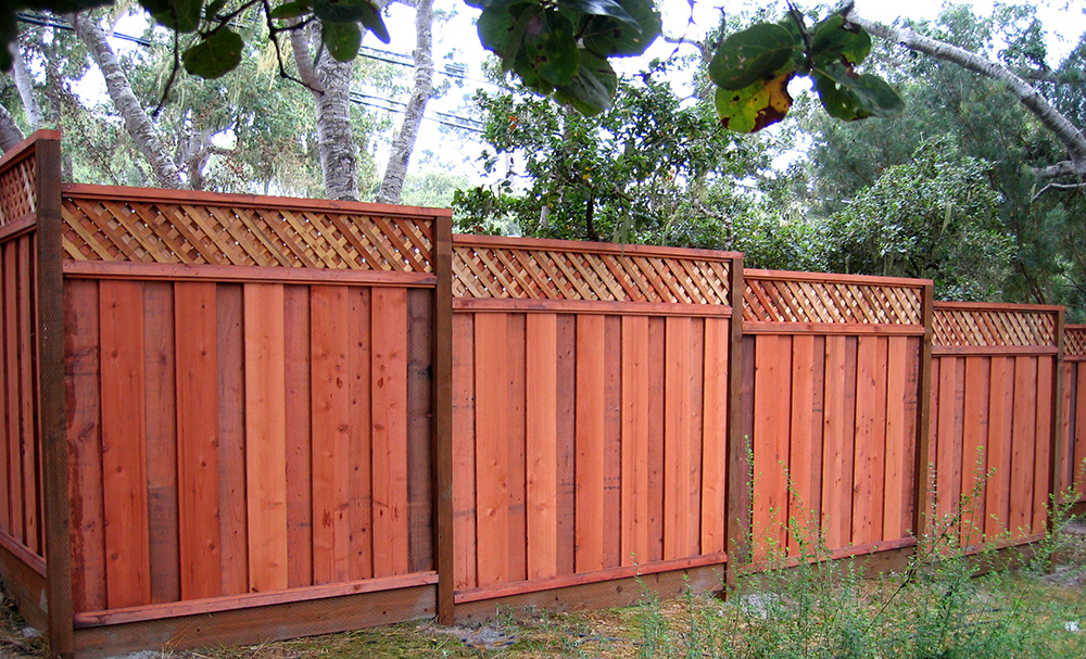 JR Fencing An example of a redwood fence installed by JR Fencing